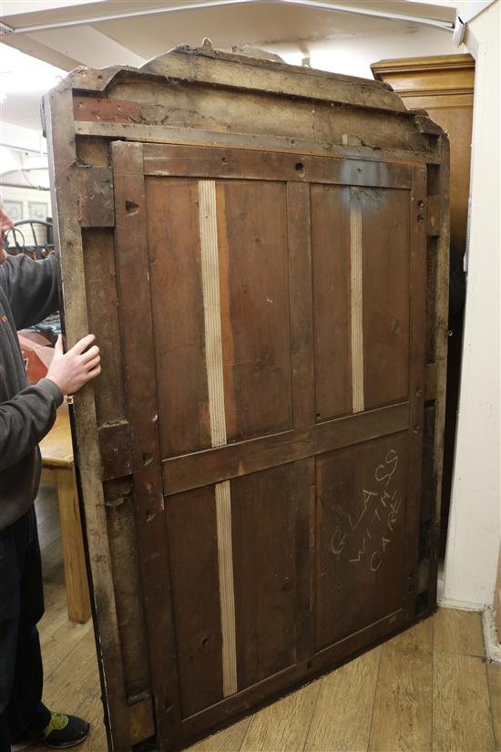 A Victorian heavily carved and painted oak overmantel W.150cm